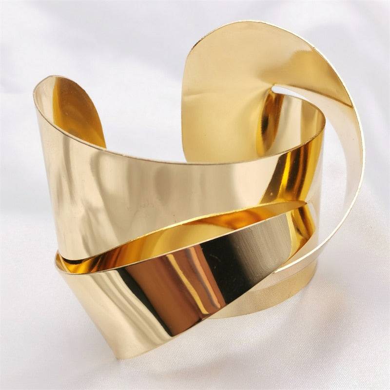 Elegant gold plated charm hair cuff with a unique curved structure, designed for locs, sisterlocks, braidlocs, dreadlocks, and braids. A perfect gothic accessory.