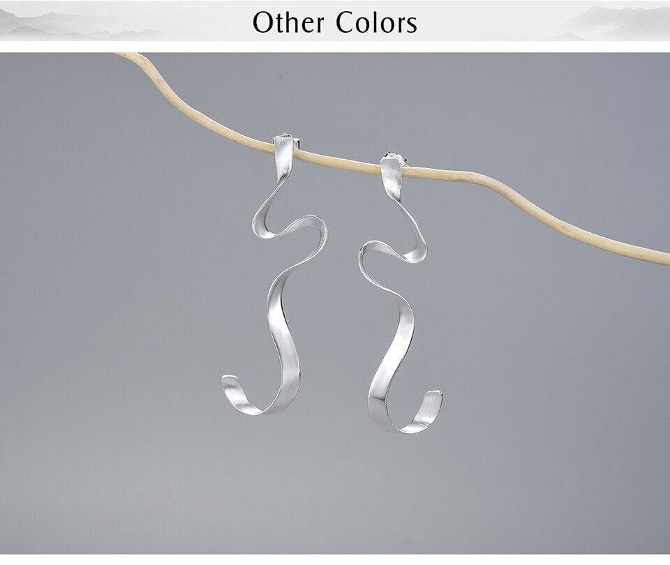Gold Spiral Curved Long Earrings