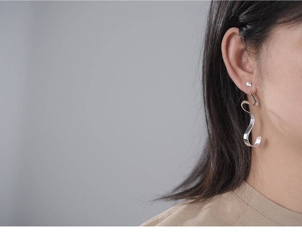 Gold Spiral Curved Long Earrings