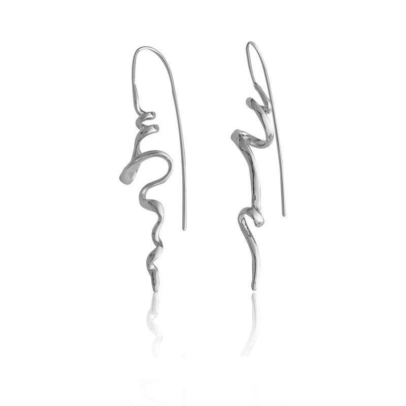 Serenity Threader Earrings in silver with a unique three-dimensional design. A modern and elegant jewelry piece for any occasion, including Memorial Day 2024.