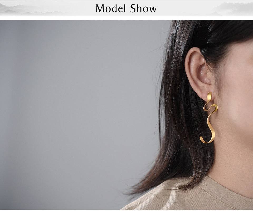 Gold Spiral Curved Long Earrings