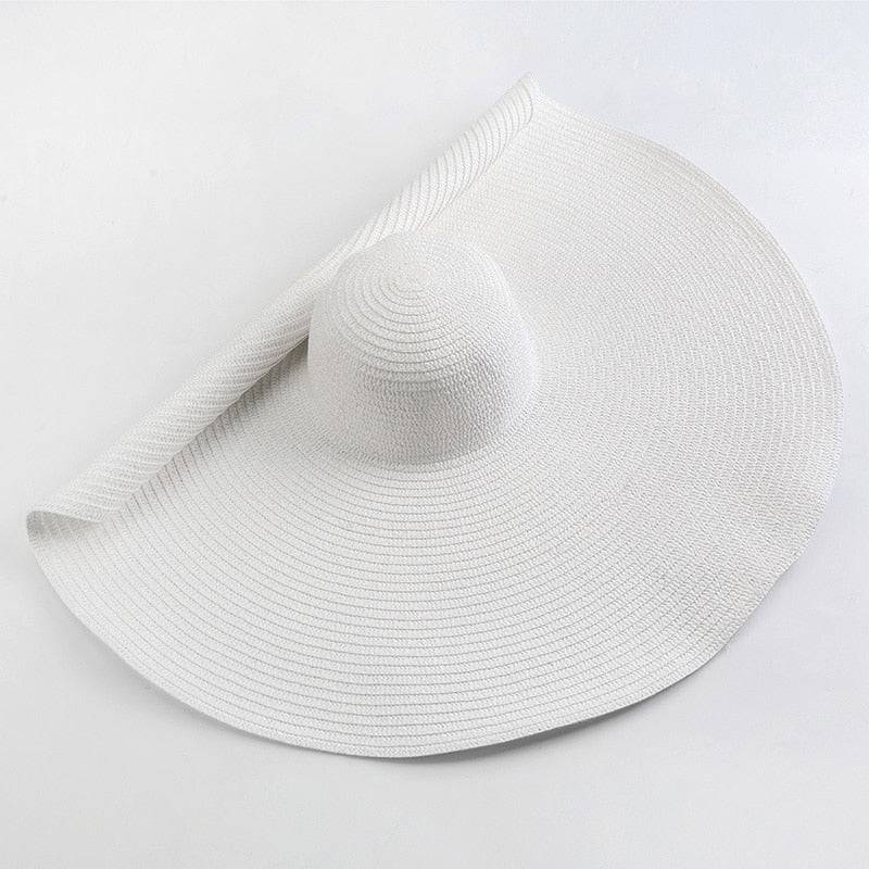 Crisp white oversized 27-inch wide brim sun hat, a must-have for summer elegance and UV protection.