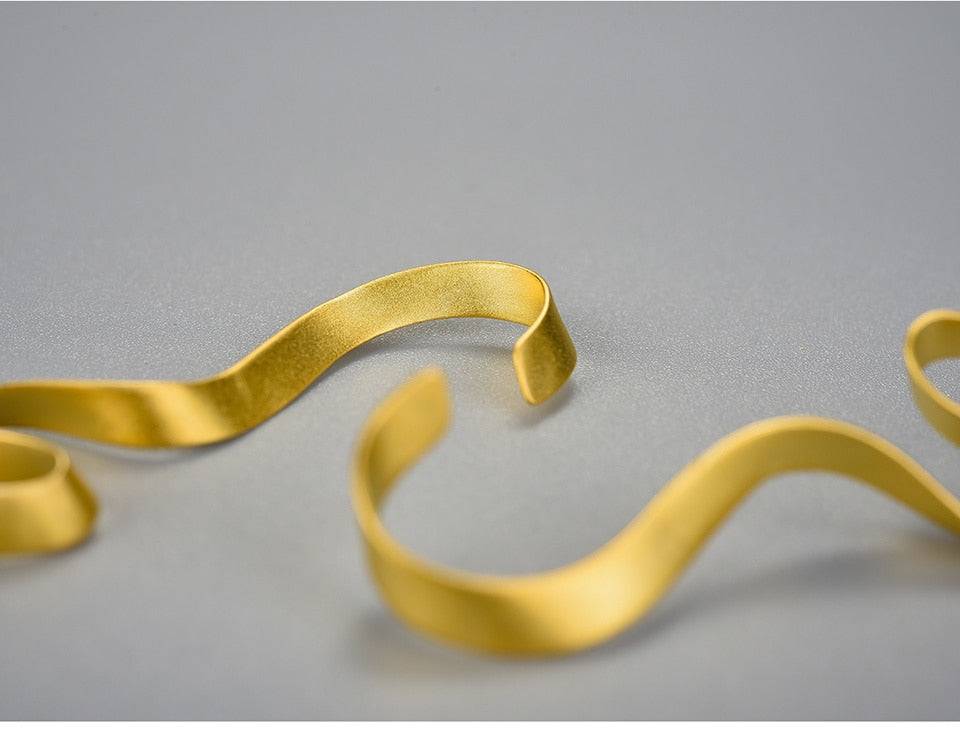 Gold Spiral Curved Long Earrings