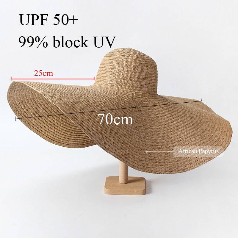 Beige oversized 27-inch wide brim sun hat with UPF 50+ and 70cm width, offering 99% UV protection.