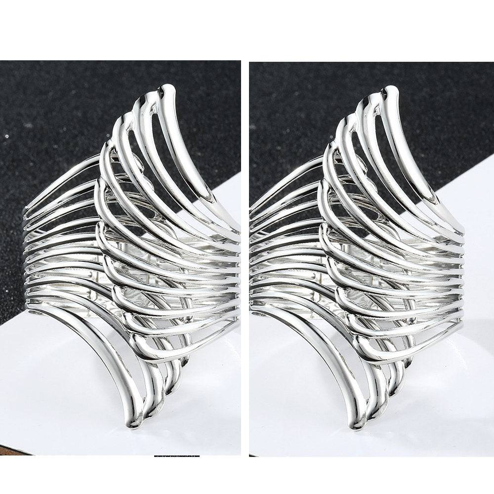 Pair of Silver Aurora Wing Cuffs, featuring an elegant wing design for locs, sisterlocks, dreadlocks, and braids. A fashionable and adjustable hair accessory.