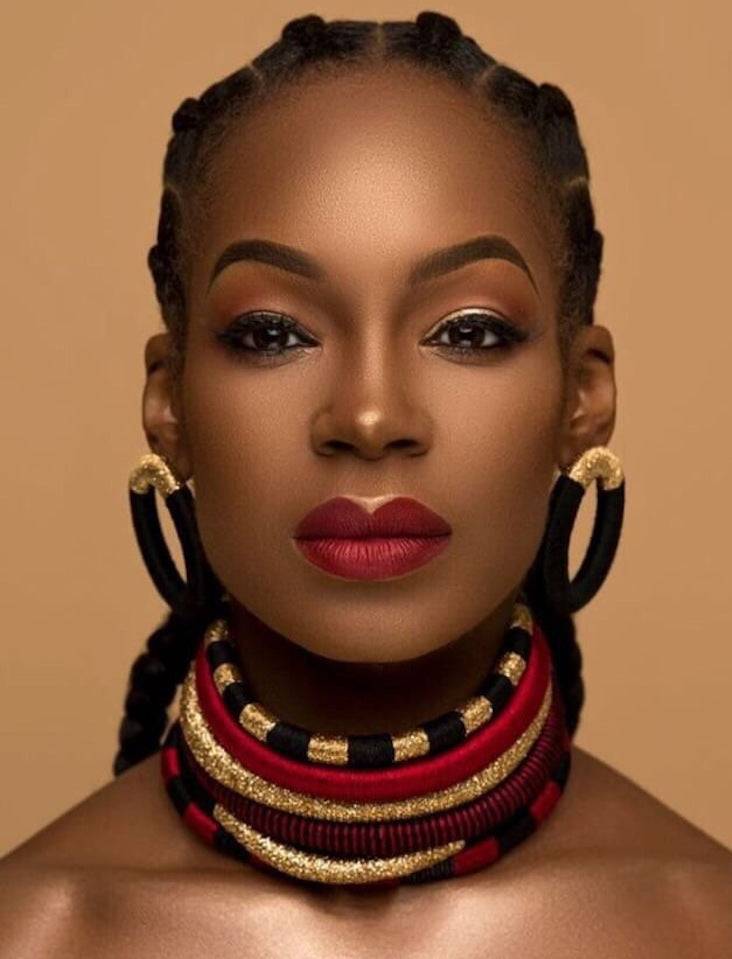 Bold African choker multi-layer necklace set in red, black, and gold with matching hoop earrings. A stunning cultural jewelry piece for fashion lovers.