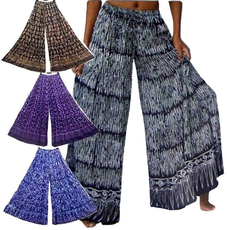 Bohemian wide leg Bali batik print hippie pants with elastic waist and drawstring. Stylish and breathable fabric for a relaxed, free-spirited look.