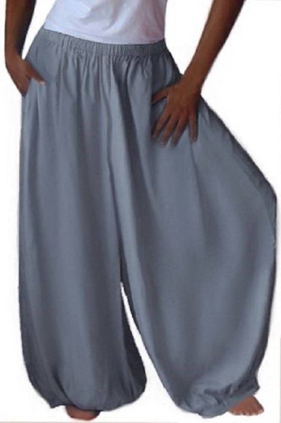 Light gray overall harem hippy pants with wide leg gaucho, plus size. Flowy and relaxed-fit boho pants with an elastic waistband and side pockets.