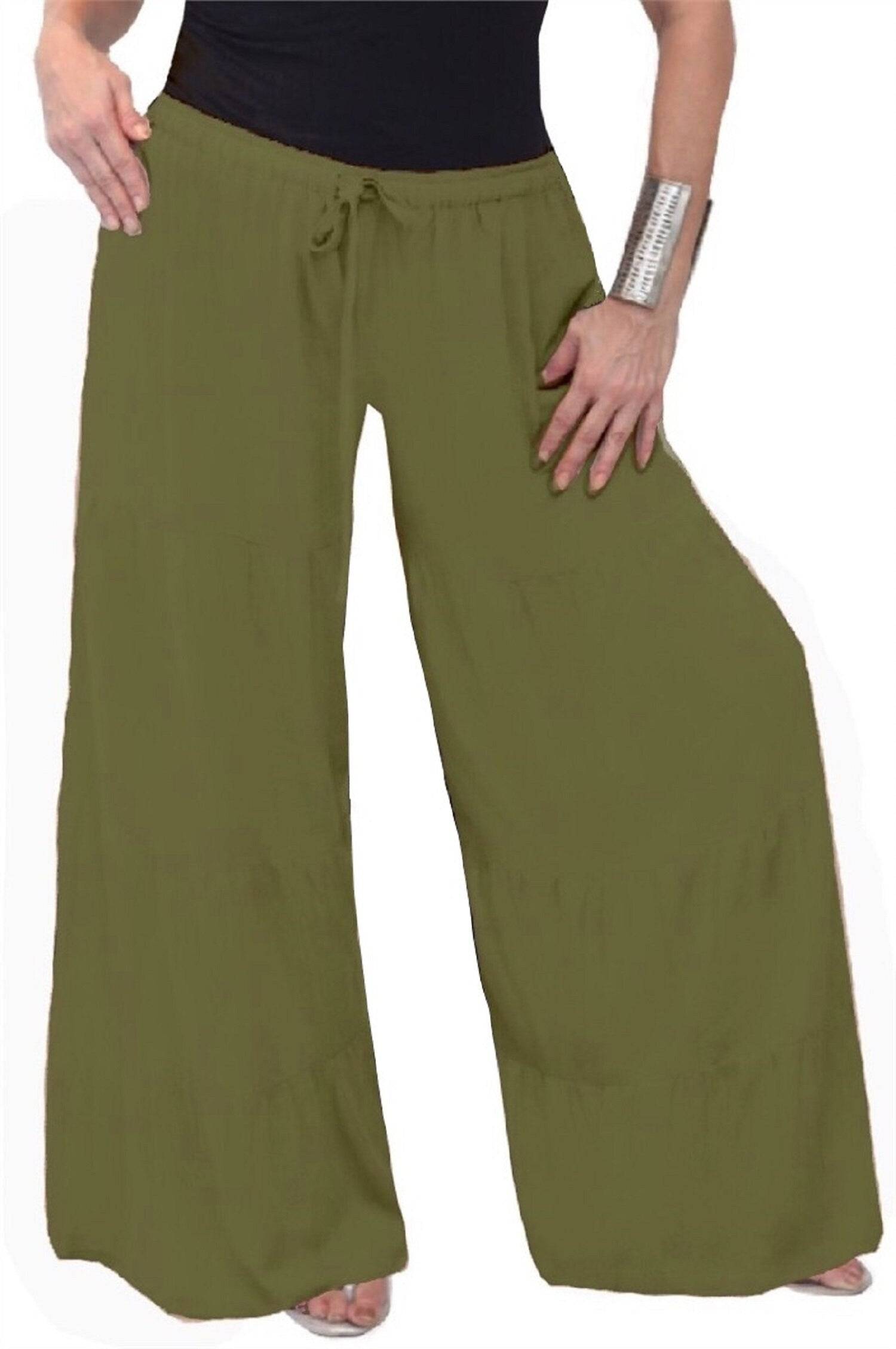 Olive green wide-leg pants with ruffled tiers and an elastic waist. A chic and comfortable choice for casual outfits.