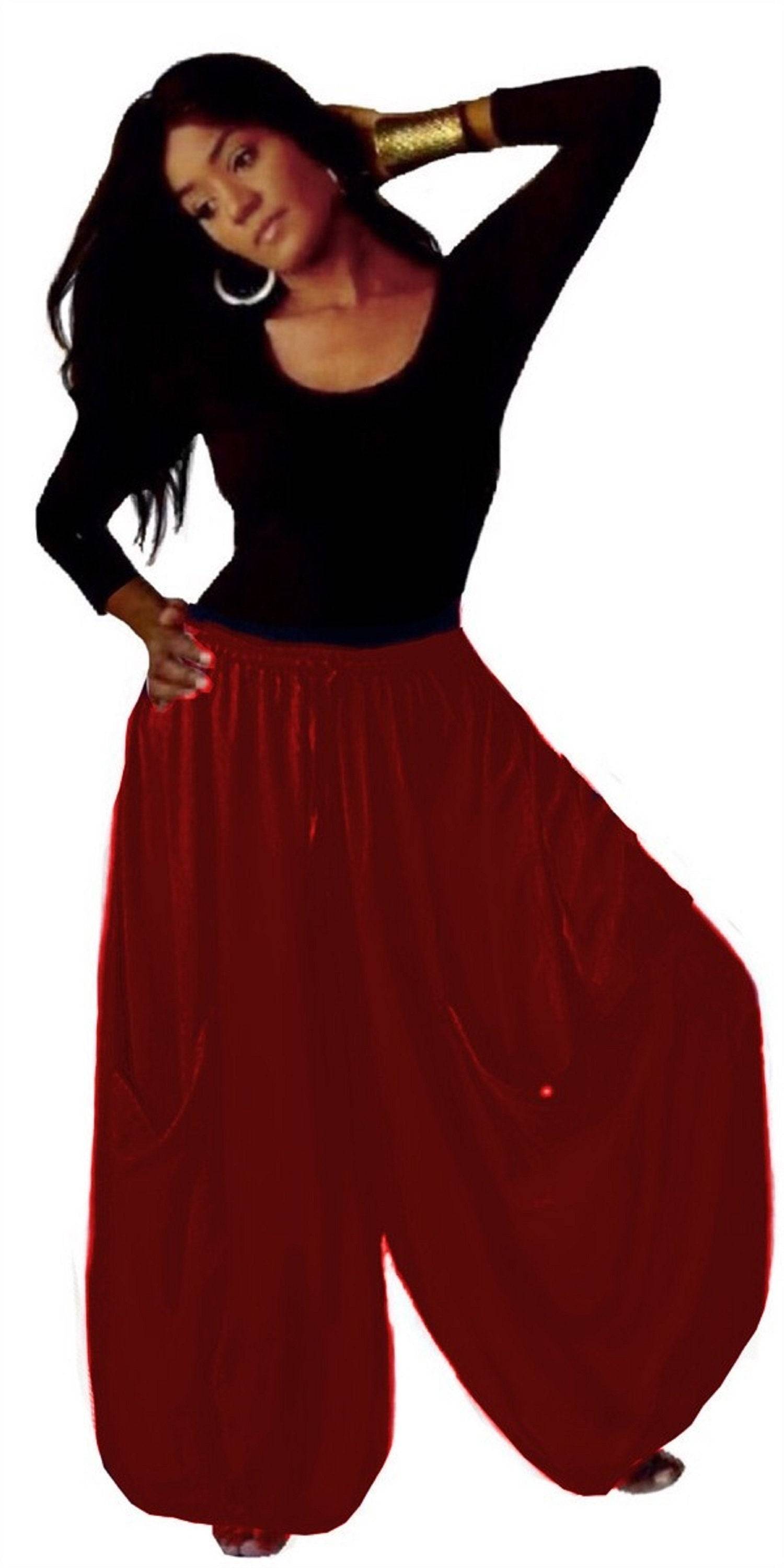 Wine-colored wide-leg gauchos pants with an elastic waist, drawstring, and big pockets, adding a bold and elegant touch to any outfit.