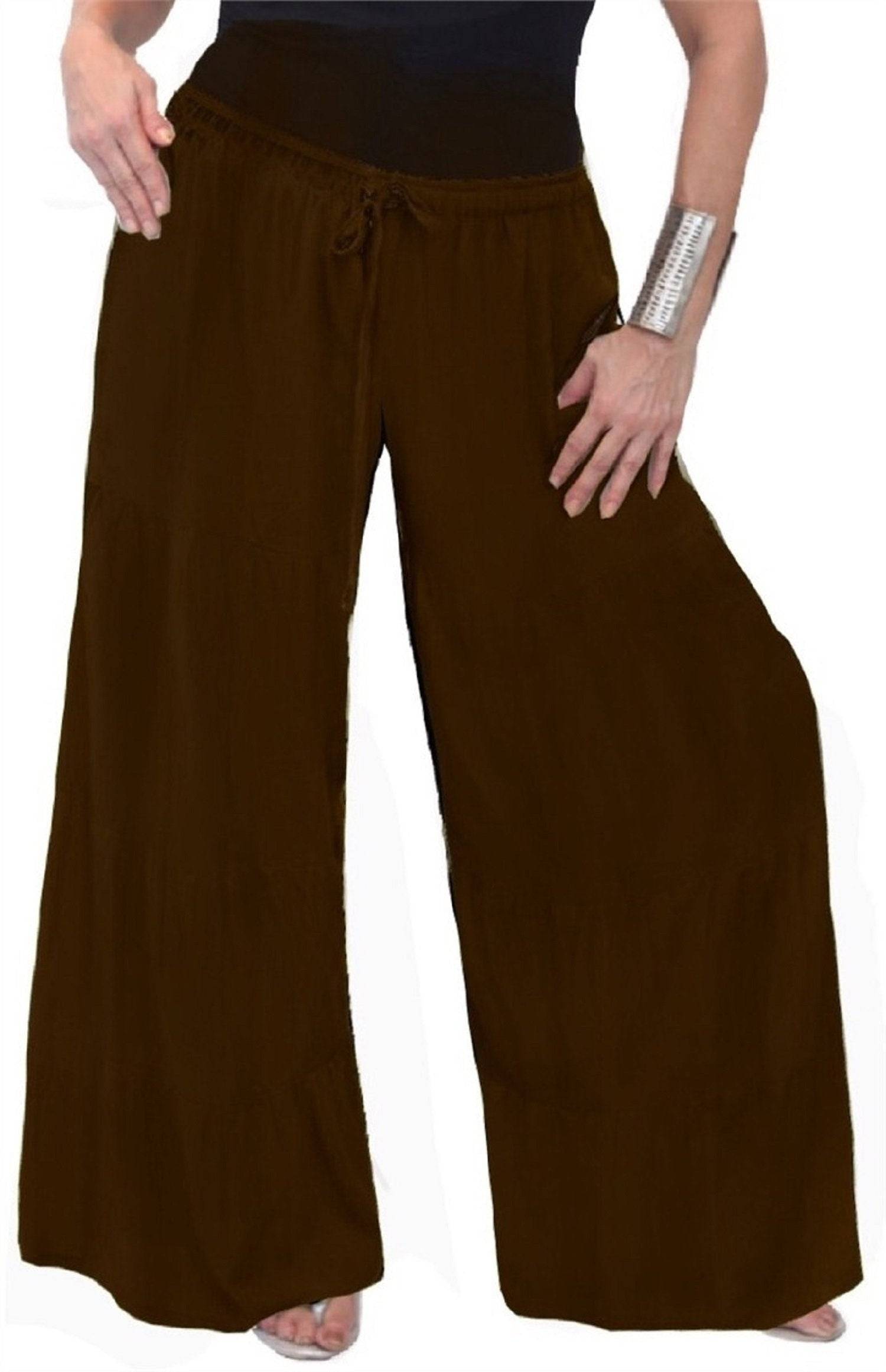 Brown ruffled tiered wide-leg pants with an elastic waist. A fashionable and comfortable choice for women&
