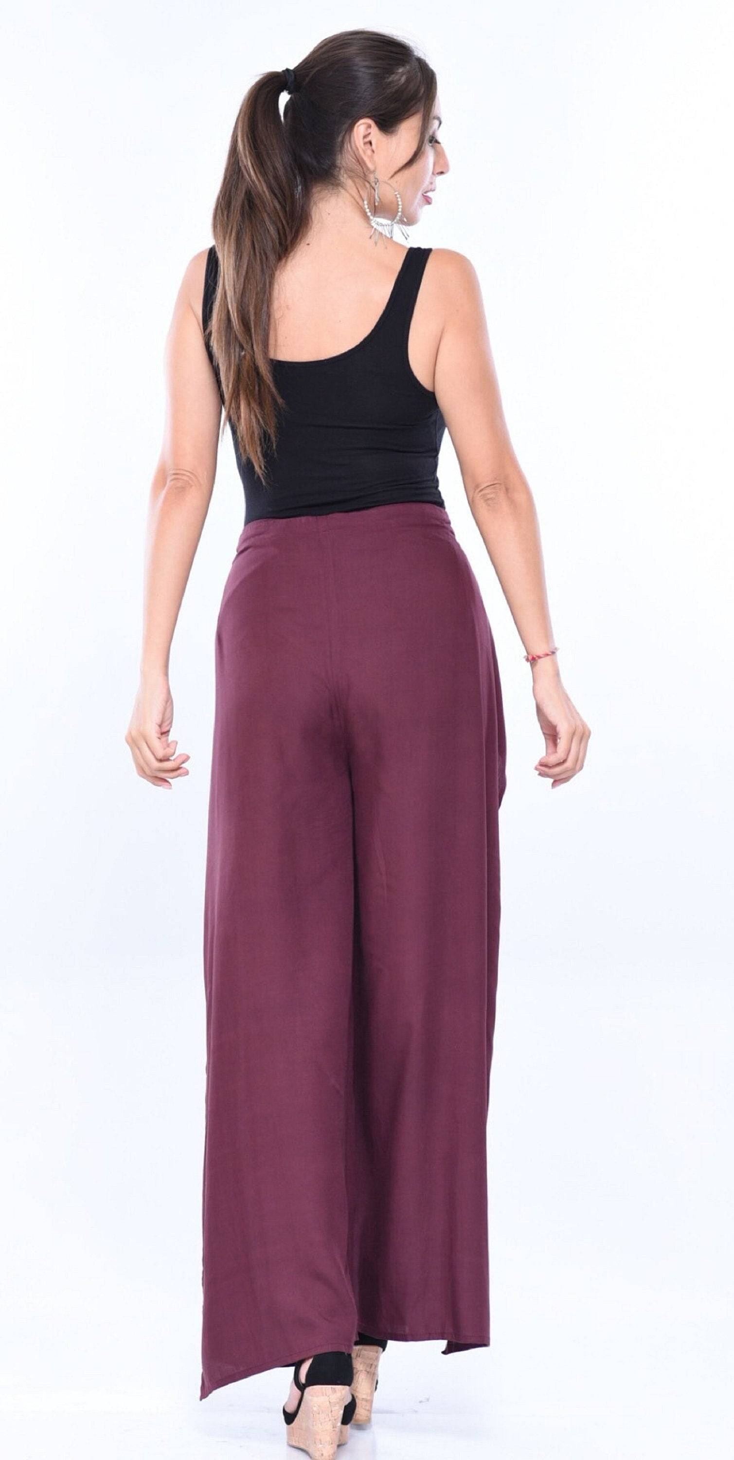 Back view of burgundy wide-leg palazzo pants with wrap tie. Elegant and flowy design for a flattering silhouette.