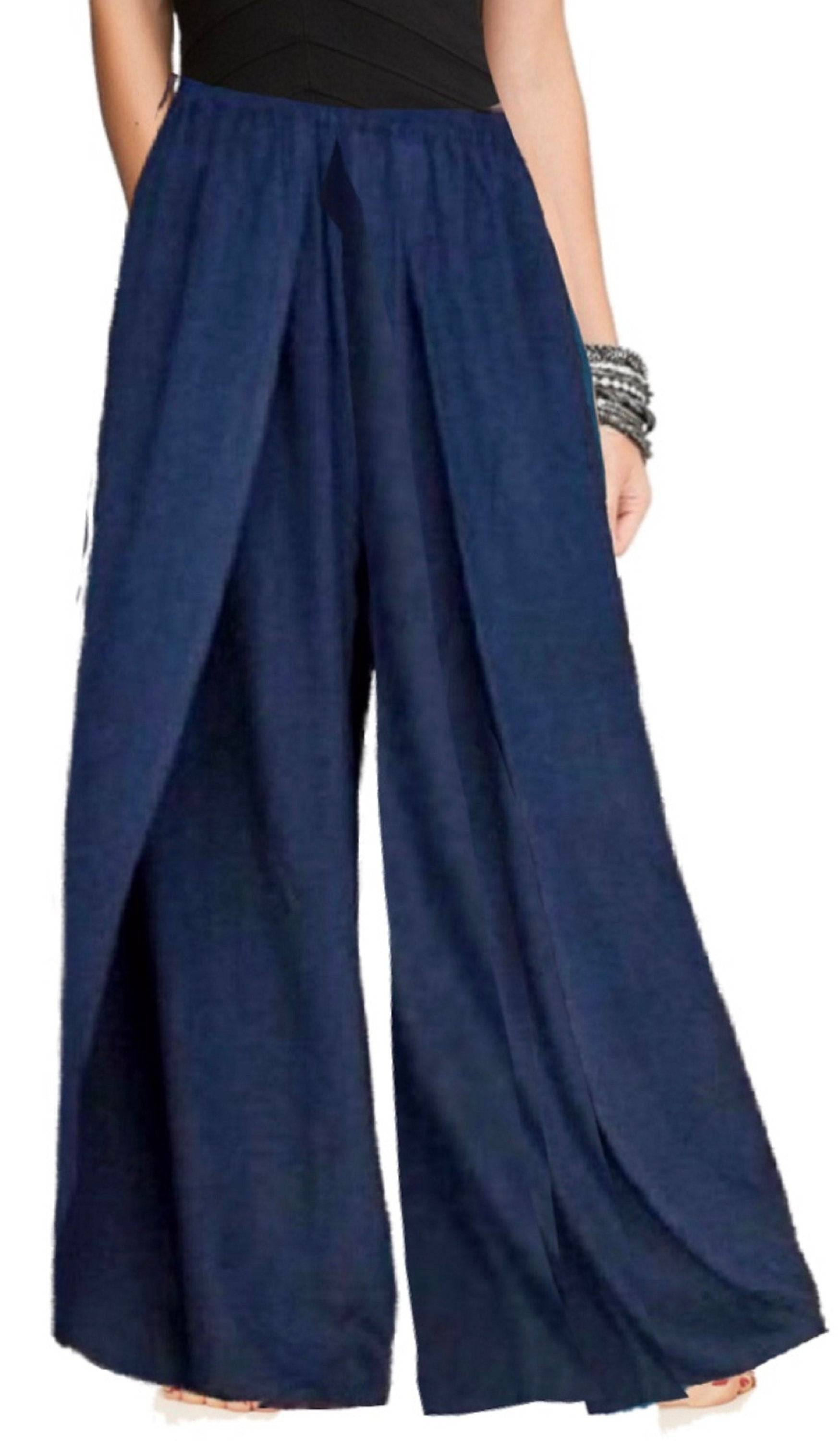 Dark blue full-length layered pants with an elastic waist, featuring a wide-leg silhouette for a bohemian style.