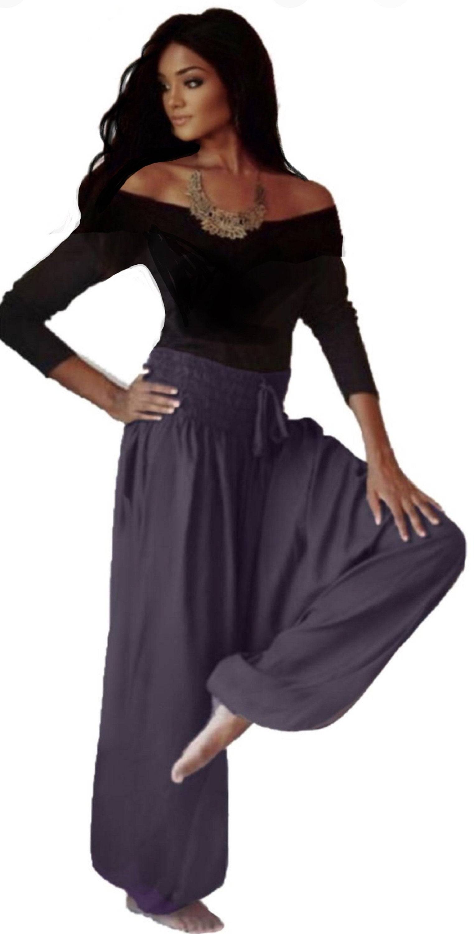 Dark gray harem diaper pants with an elastic smocked waist, featuring a loose and comfortable fit for women in a boho style.