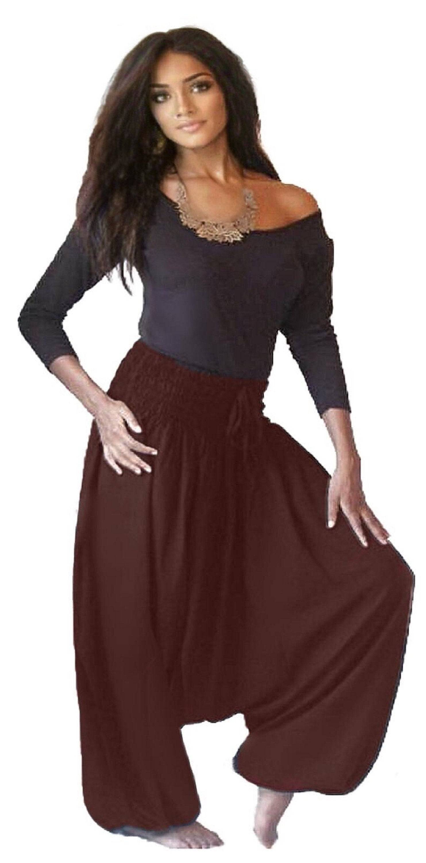 Brown harem diaper pants with an elastic smocked waistband, featuring a loose and flowy design for casual or lounge wear.