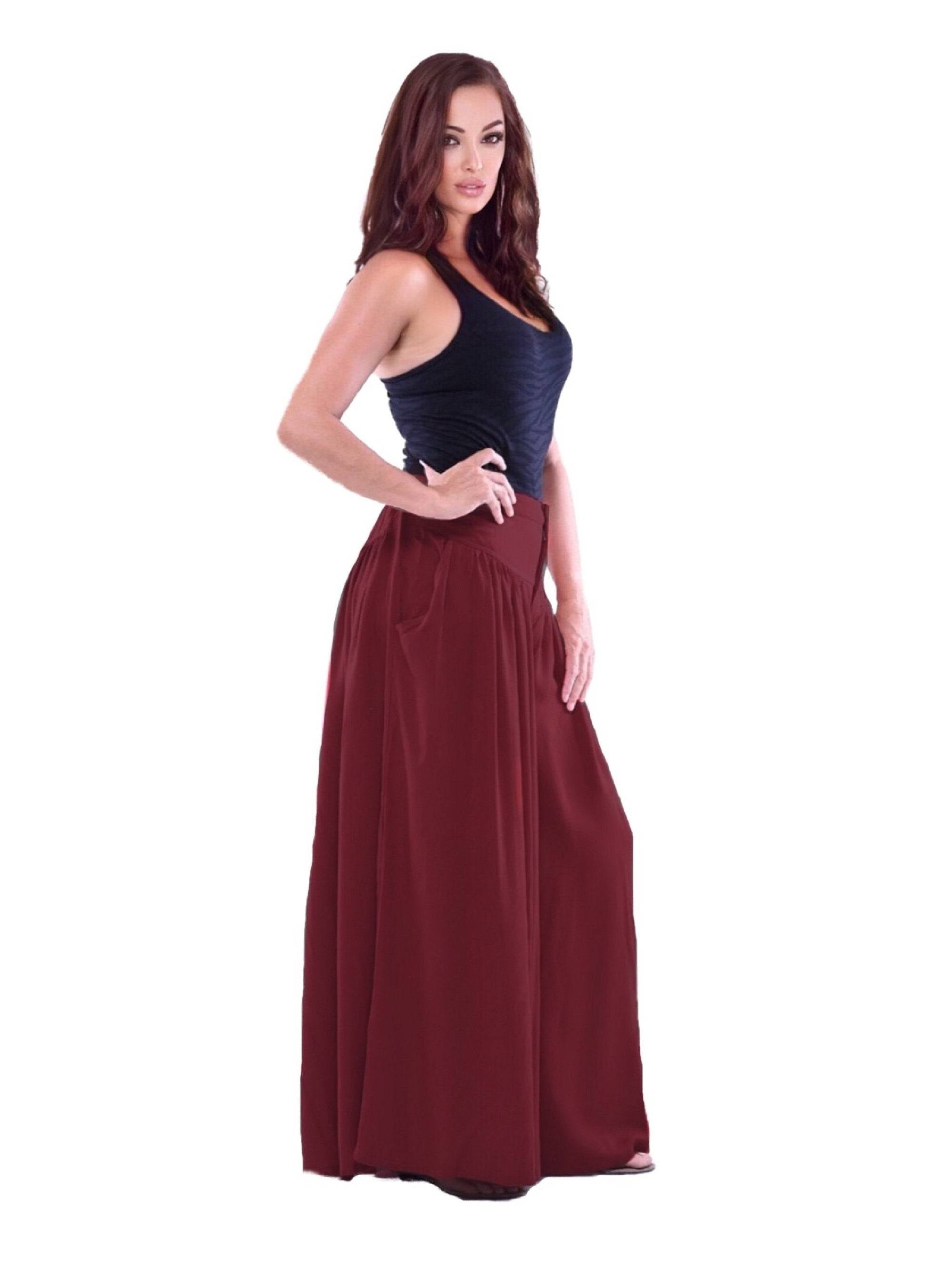 Brown split skirt palazzo pants with pockets, elastic back, and wide-leg fit. A versatile and stylish choice for any occasion.