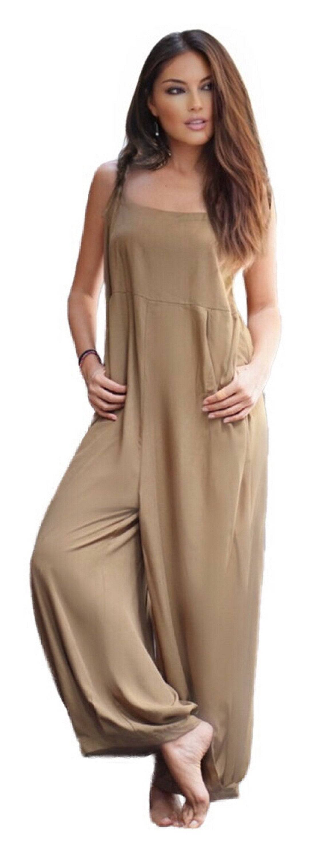 Casual plus size spaghetti strap jumpsuit with wide legs and pockets in red. Flowy and breathable fabric for all-day comfort.