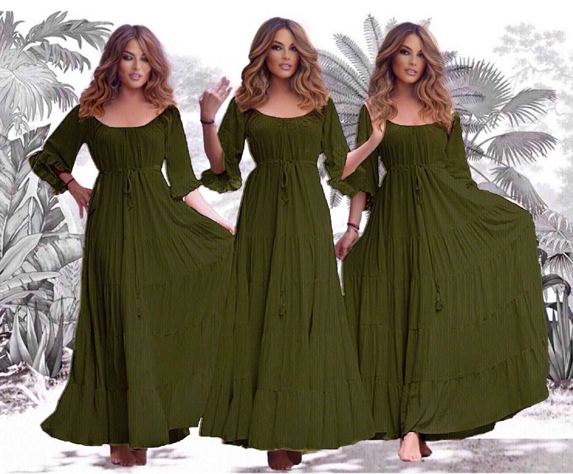 Elegant maxi dress with sleeves in deep olive green, featuring an empire bust and flowing tiered design. Perfect for boho, Viking renaissance, or Wiccan styles.