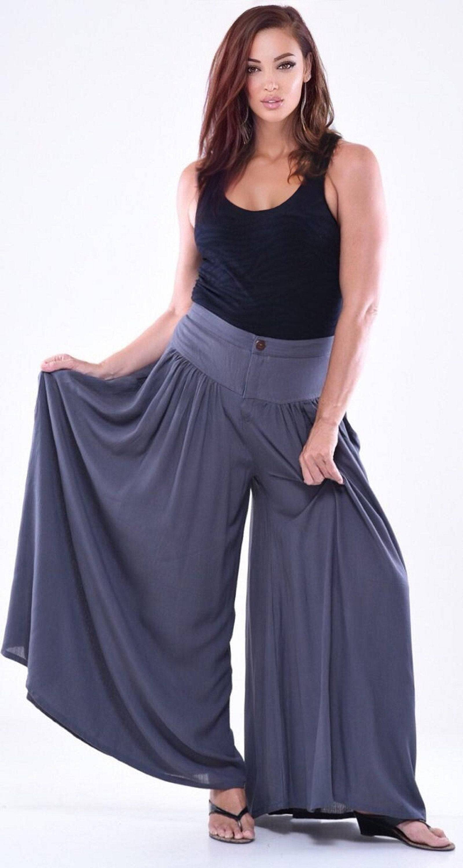 Gray split skirt palazzo pants with pockets, elastic back, and wide-leg design. Flowy and comfortable for everyday wear.