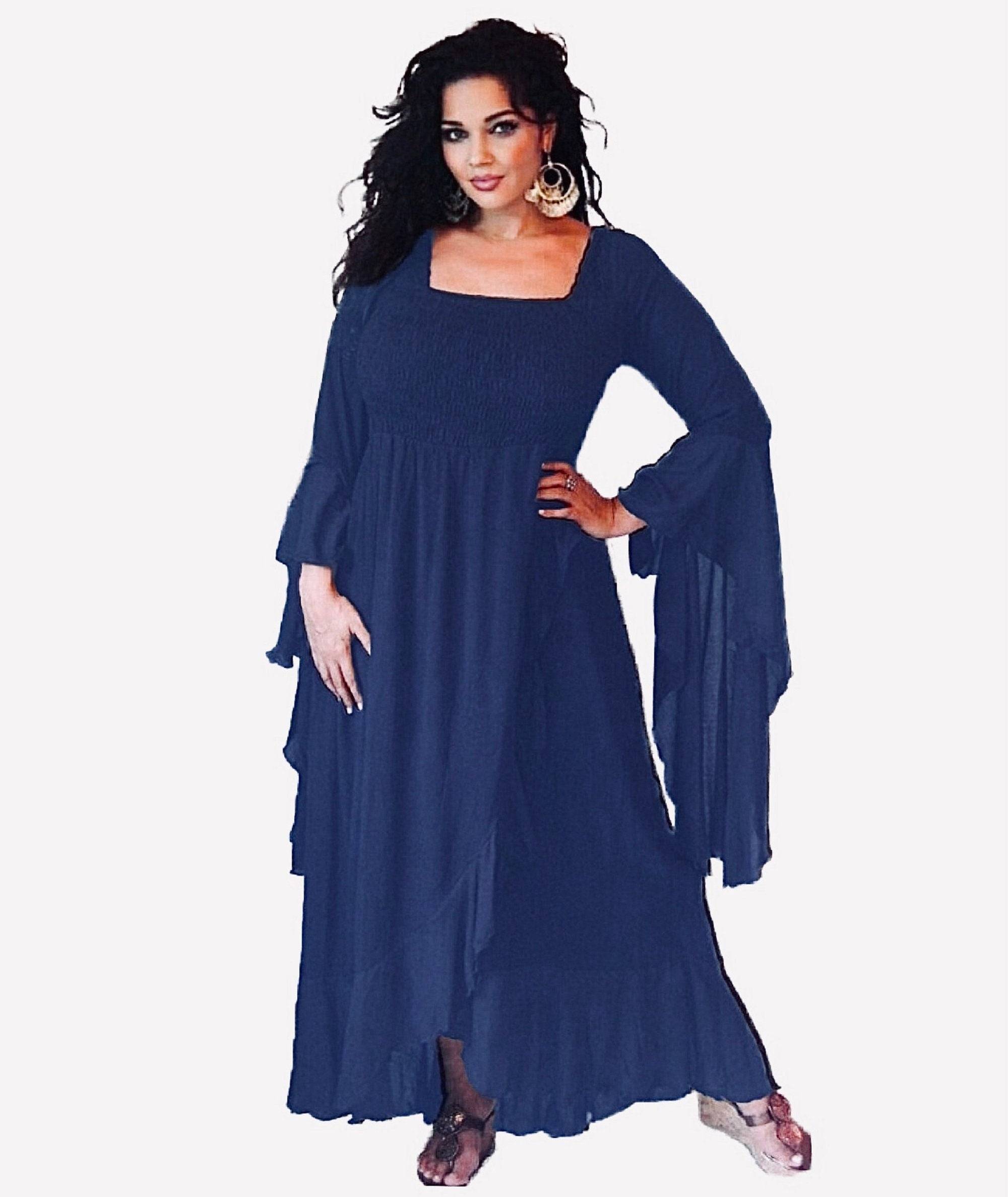 Navy blue ruffle wrap maxi dress with waterfall sleeves, designed with a smocked bodice and cascading hem for a sophisticated boho style.