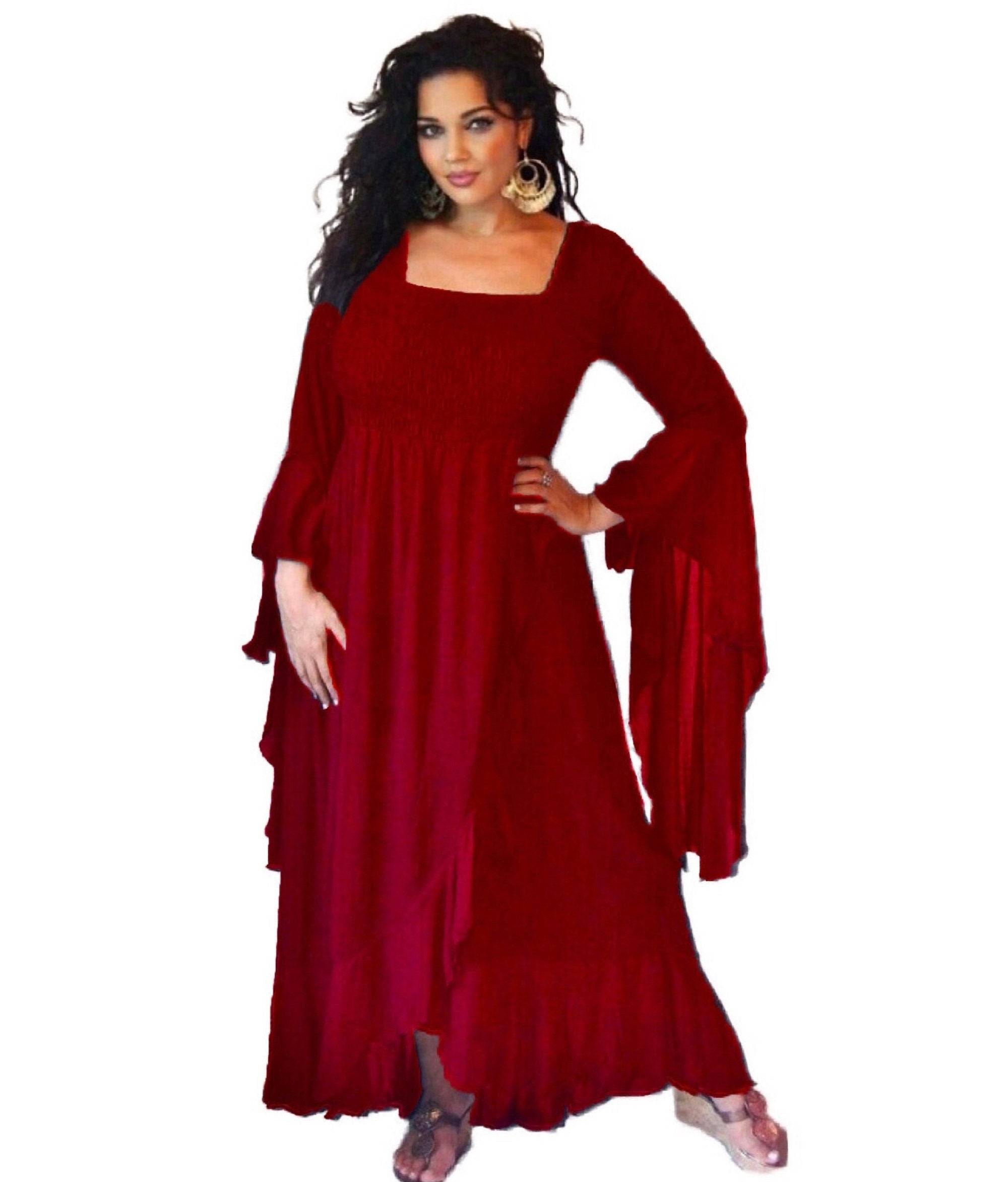 Bold red ruffle wrap maxi dress with waterfall sleeves, featuring a smocked bodice and cascading hem, perfect for boho and evening wear.