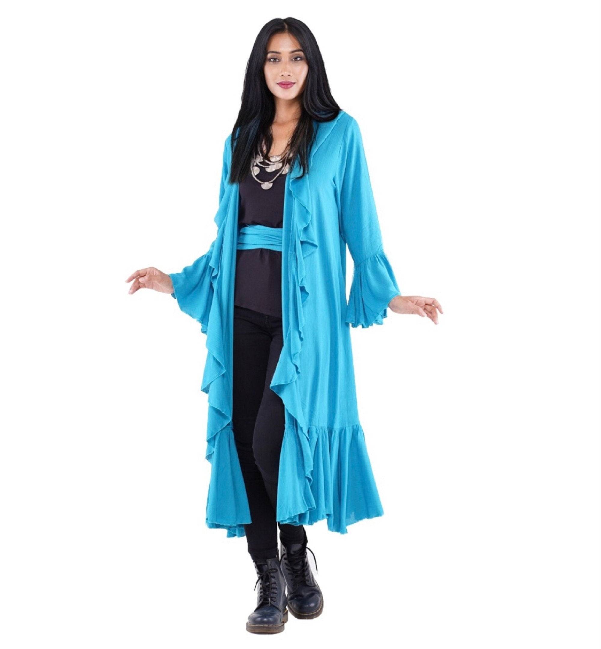 Vibrant blue kimono-style wrap dress with ruffle details and a wide belt, styled with black boots for a chic boho look.
