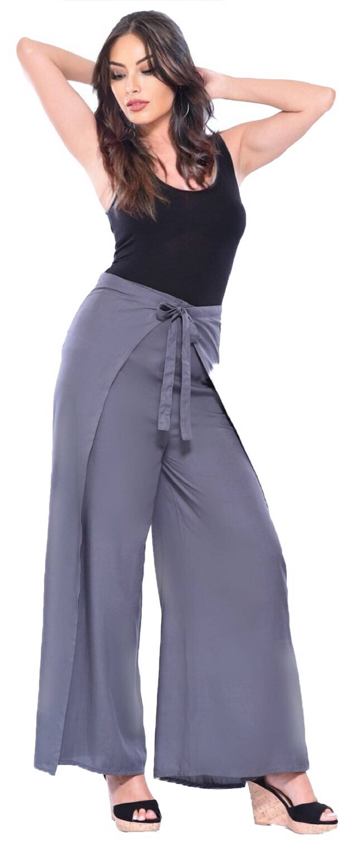 Gray wide-leg palazzo pants with wrap tie, featuring a relaxed fit. Perfect for casual and elegant occasions.