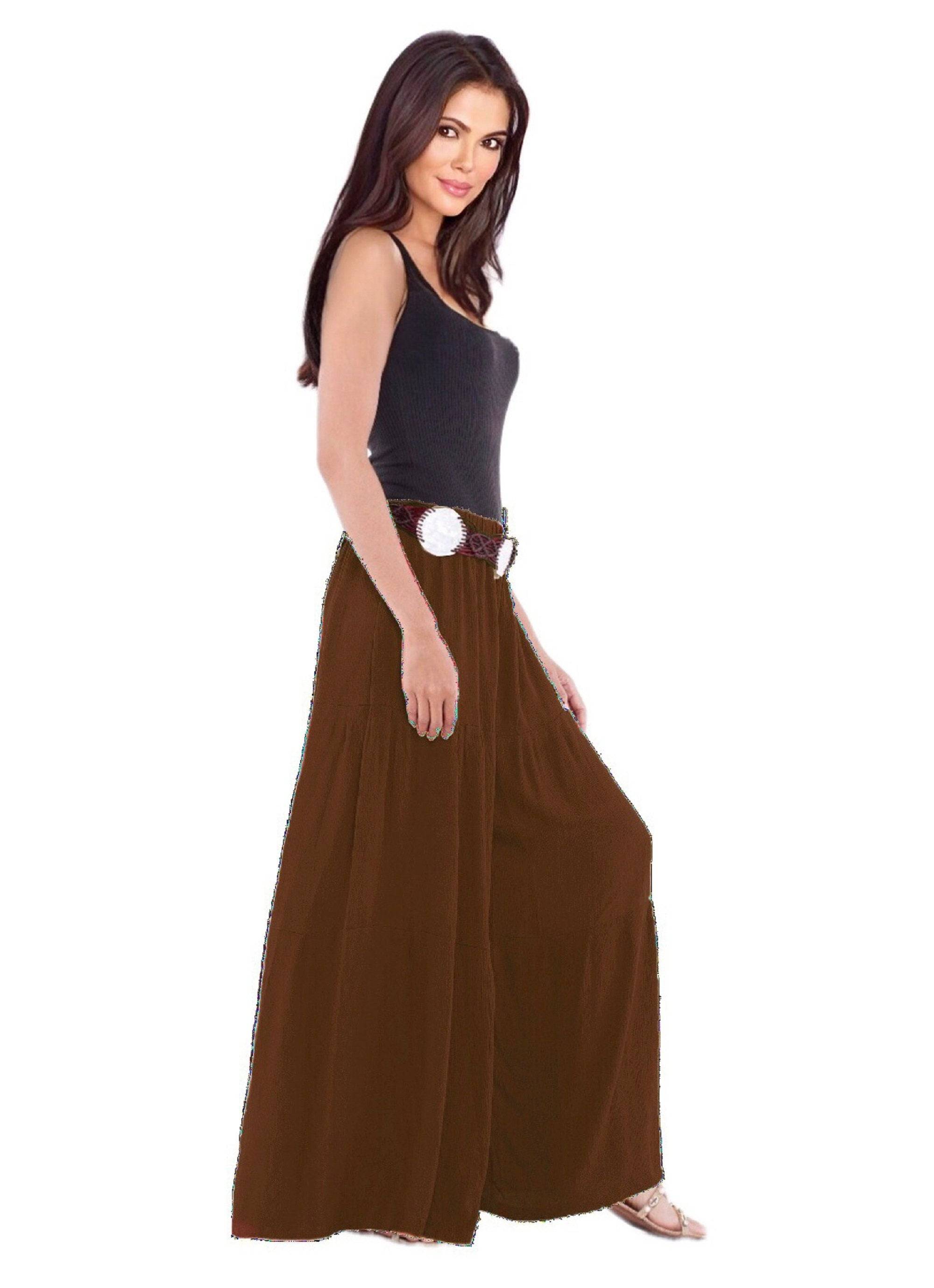 Brown gauchos wide-leg ruffled pants with an elastic waist and drawstring ties. A versatile and earthy tone for any outfit.