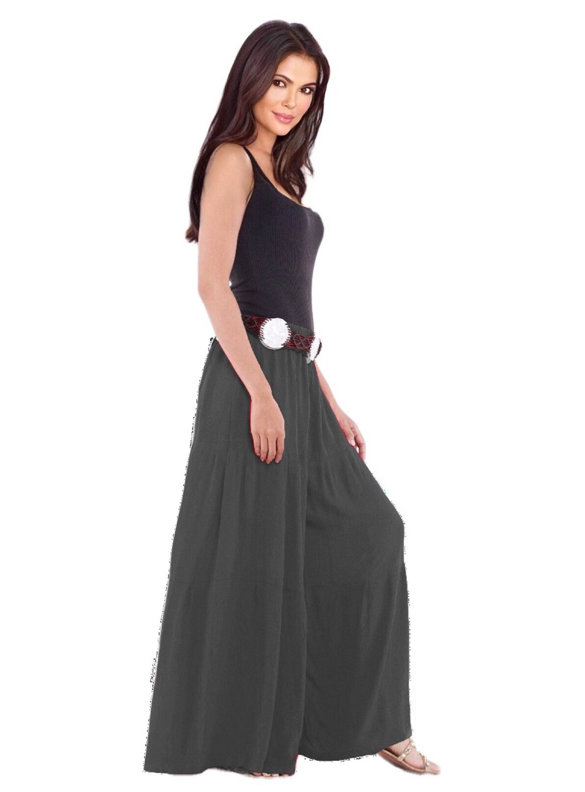Gray gauchos wide-leg ruffled pants with an elastic waist and drawstring ties. A neutral and stylish option for all sizes.