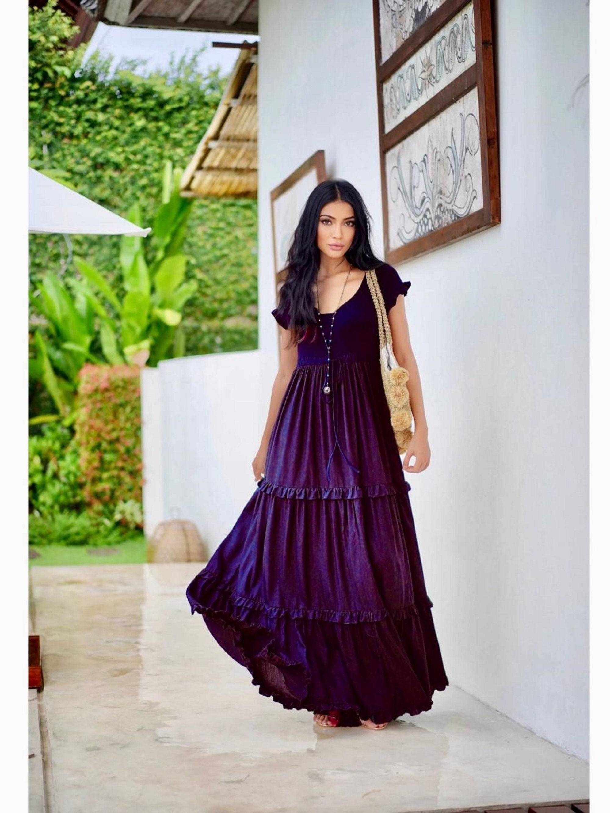 Elegant gypsy tiered summer maxi dress in deep purple with a stretch bodice, ruffled sleeves, and flowing silhouette, perfect for all sizes.