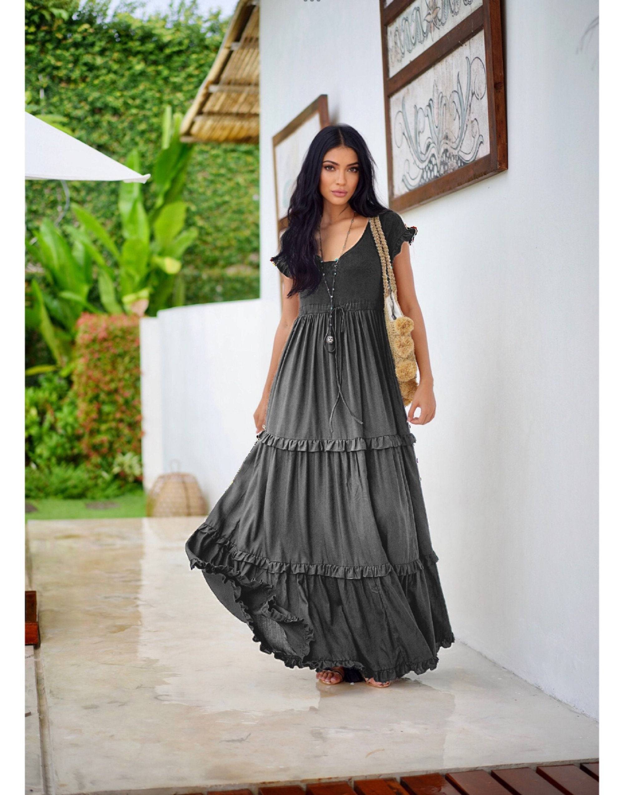 Stylish charcoal gray gypsy tiered summer maxi dress with a stretch bodice and ruffled tiers, offering a flattering fit for all body types.