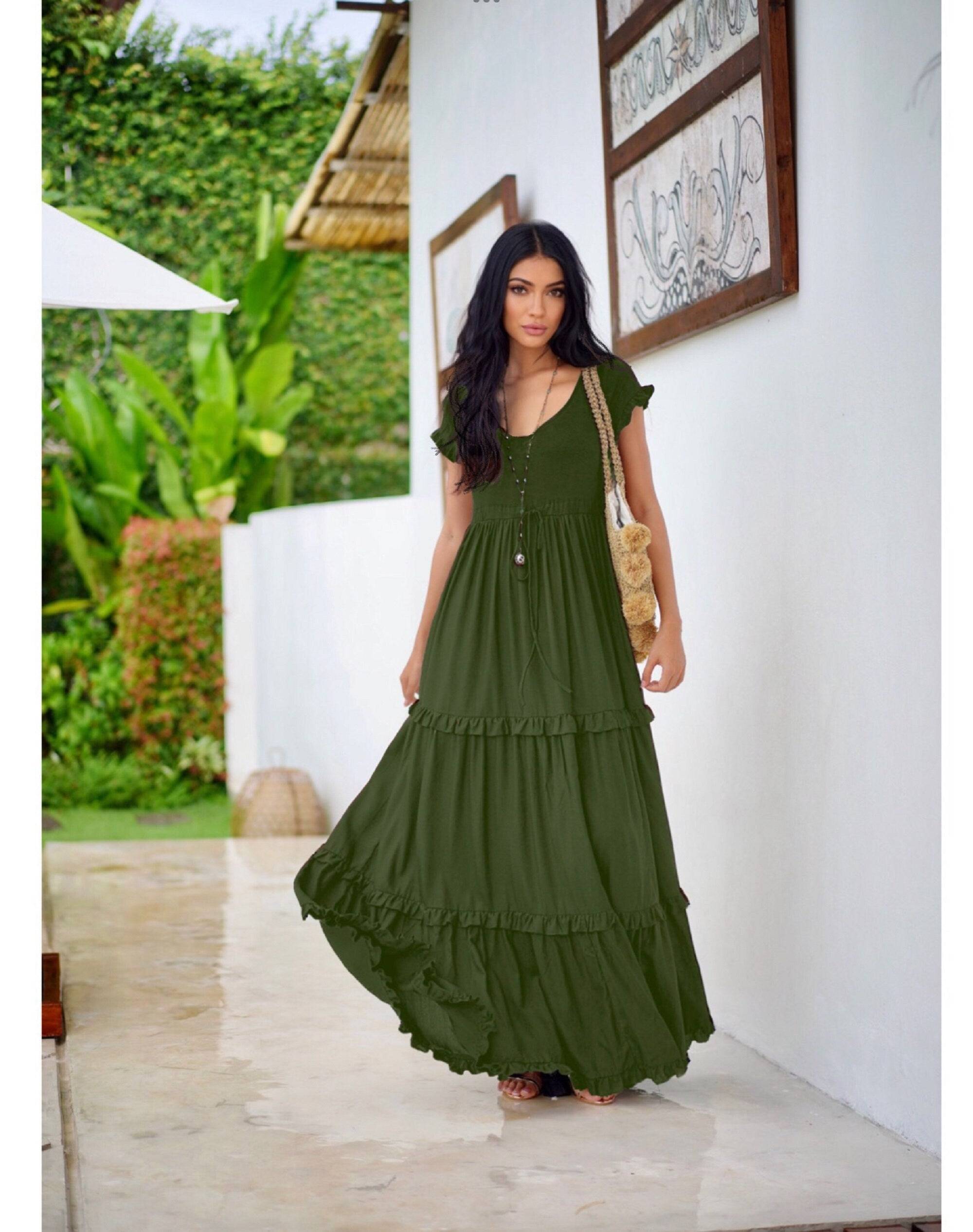 Forest green gypsy tiered summer maxi dress with a stretch bodice and flowing ruffled layers, designed for comfort and effortless style.