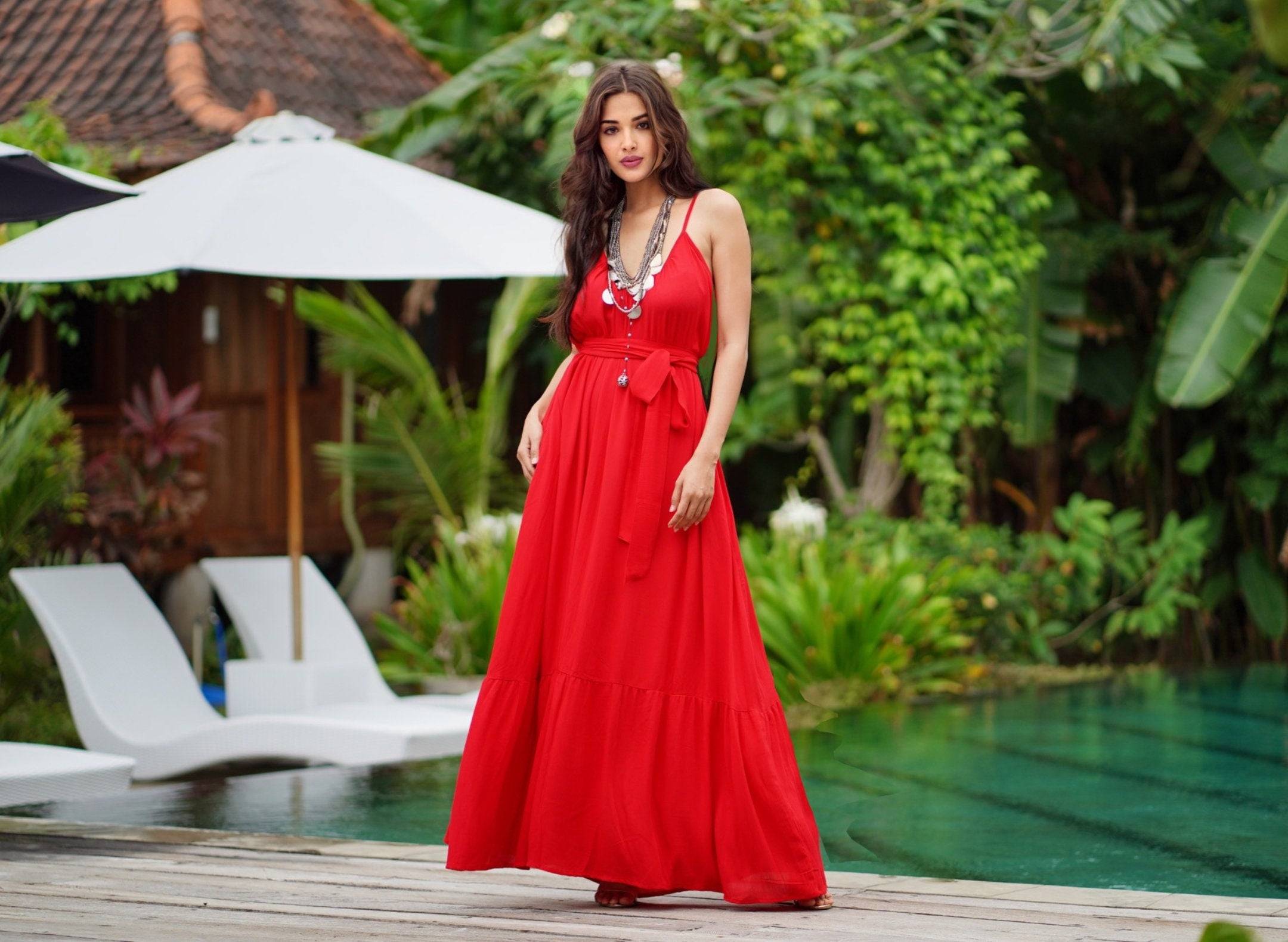 Vibrant red Renaissance maxi dress with a belted waist and pockets. A stylish and comfortable sundress for all sizes, ideal for summer outings.