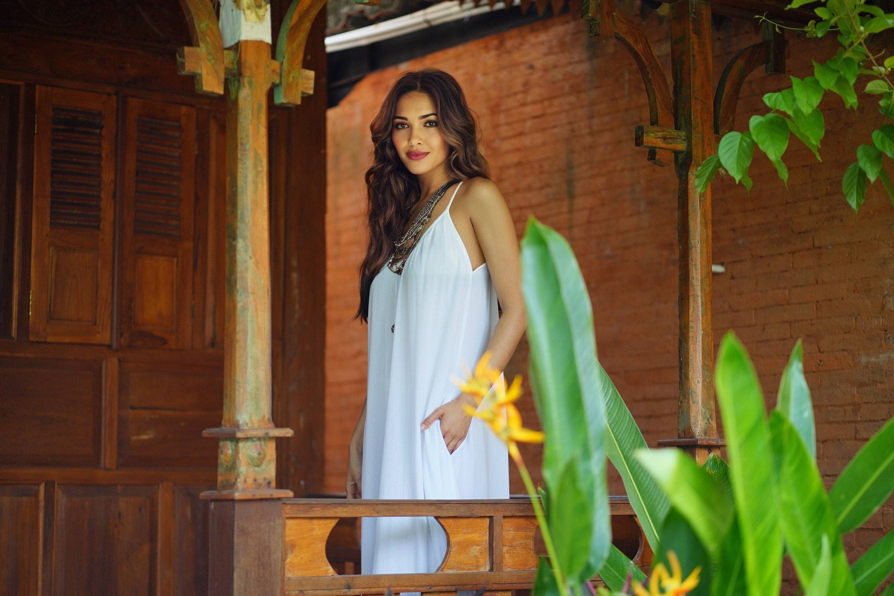 Elegant white Renaissance maxi dress with pockets, featuring a relaxed and airy design. A timeless belted sundress suitable for all sizes.