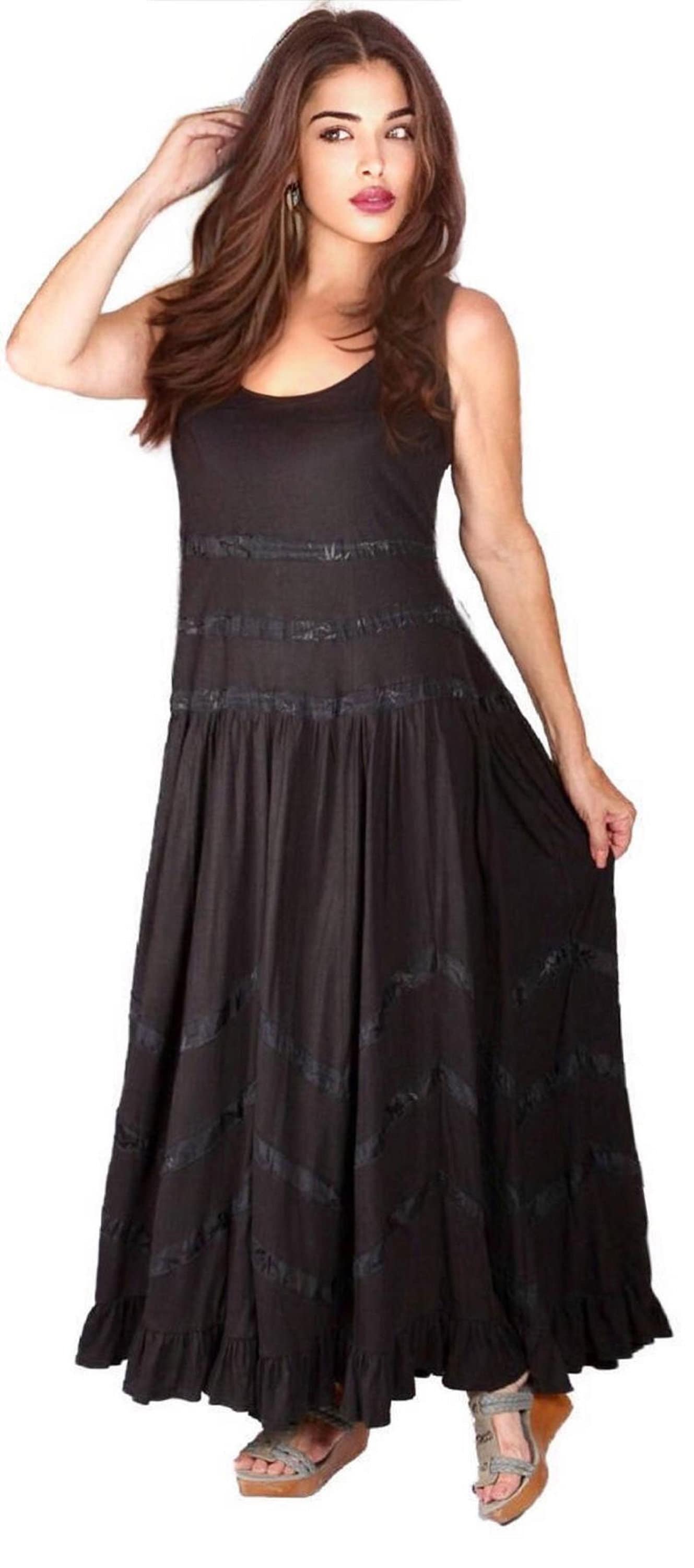 Black vintage jersey maxi dress with stretch fabric and zig-zag trim. A chic and versatile boho dress for all occasions and sizes.