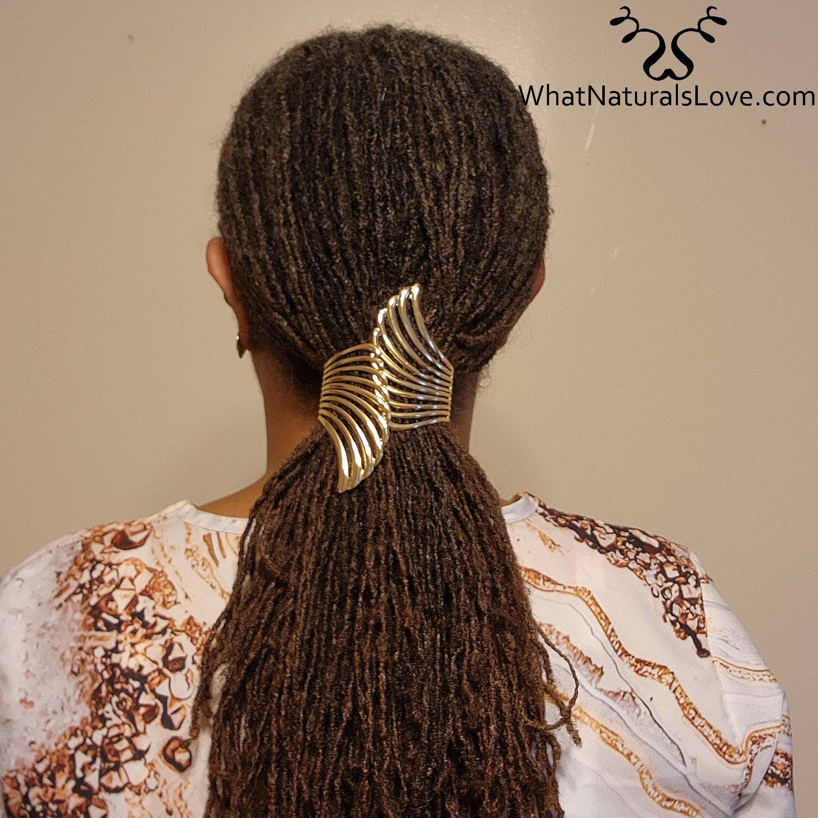 Back view of Gold Aurora Wing Cuff securing locs in a ponytail. A stylish and adjustable hair cuff for dreadlocks, sisterlocks, and braids.