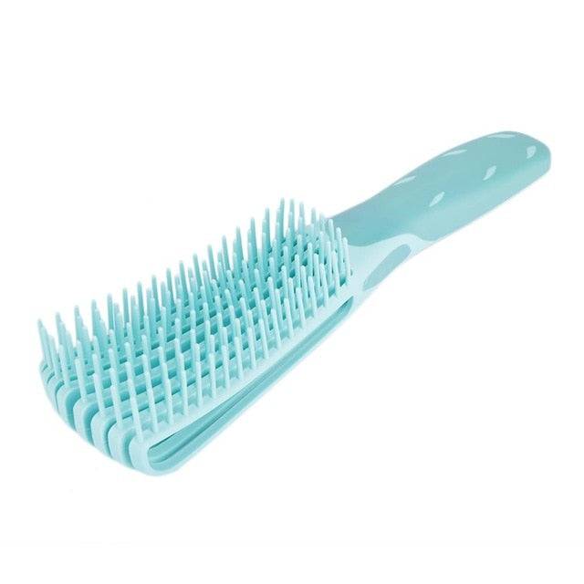 Blue Painless Detangler Brush for natural hair, ideal for 4C curls, reduces detangling time and minimizes breakage.