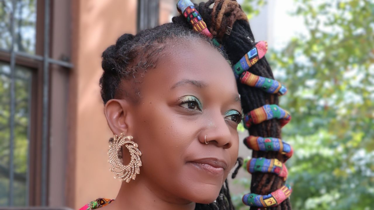 How Dawn Rocks the Colorful Spiral-Wrapped Locs