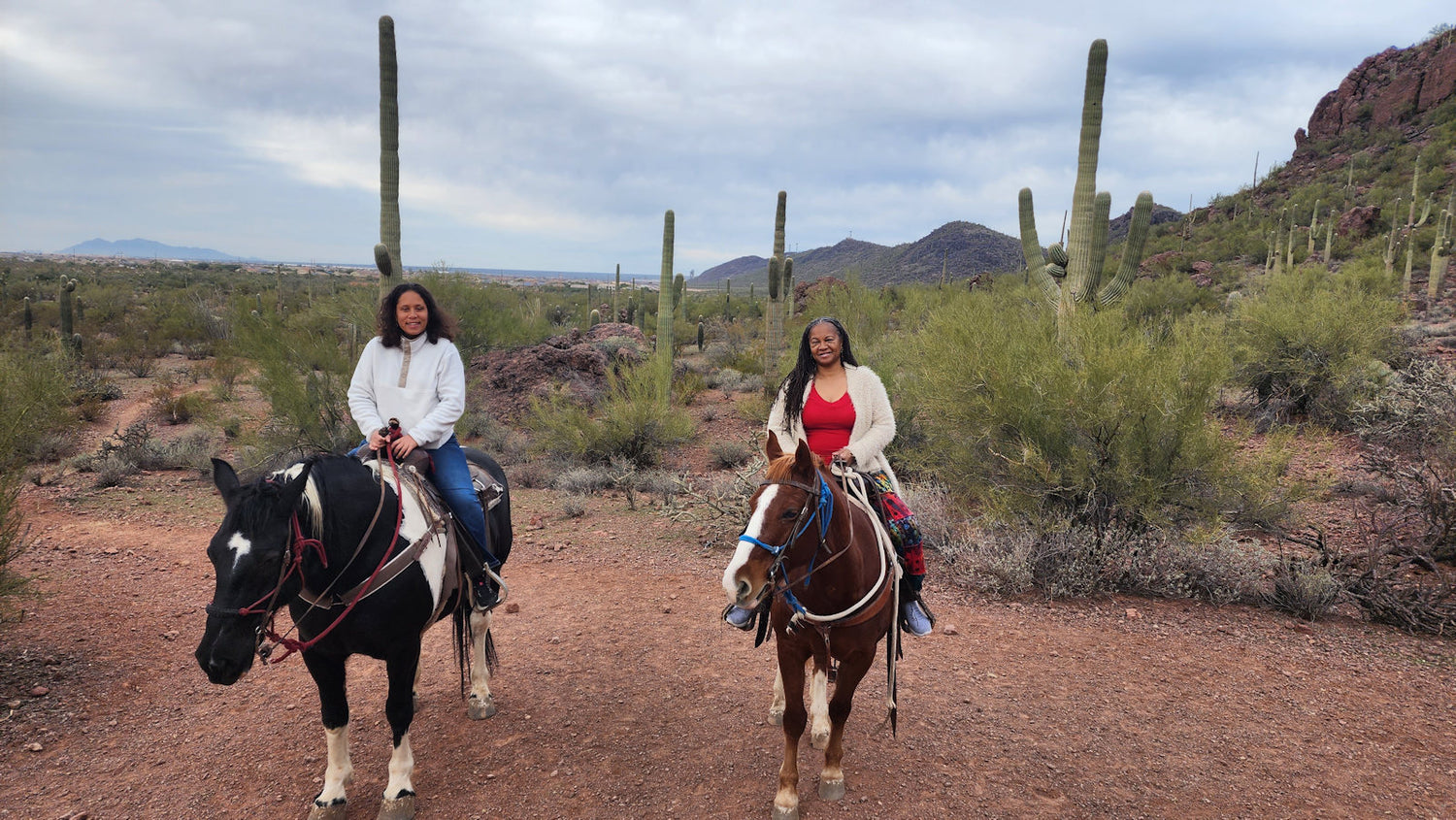 Mireille Liong Long Locs in Tucsan Arizona on a horse with niece Gaby