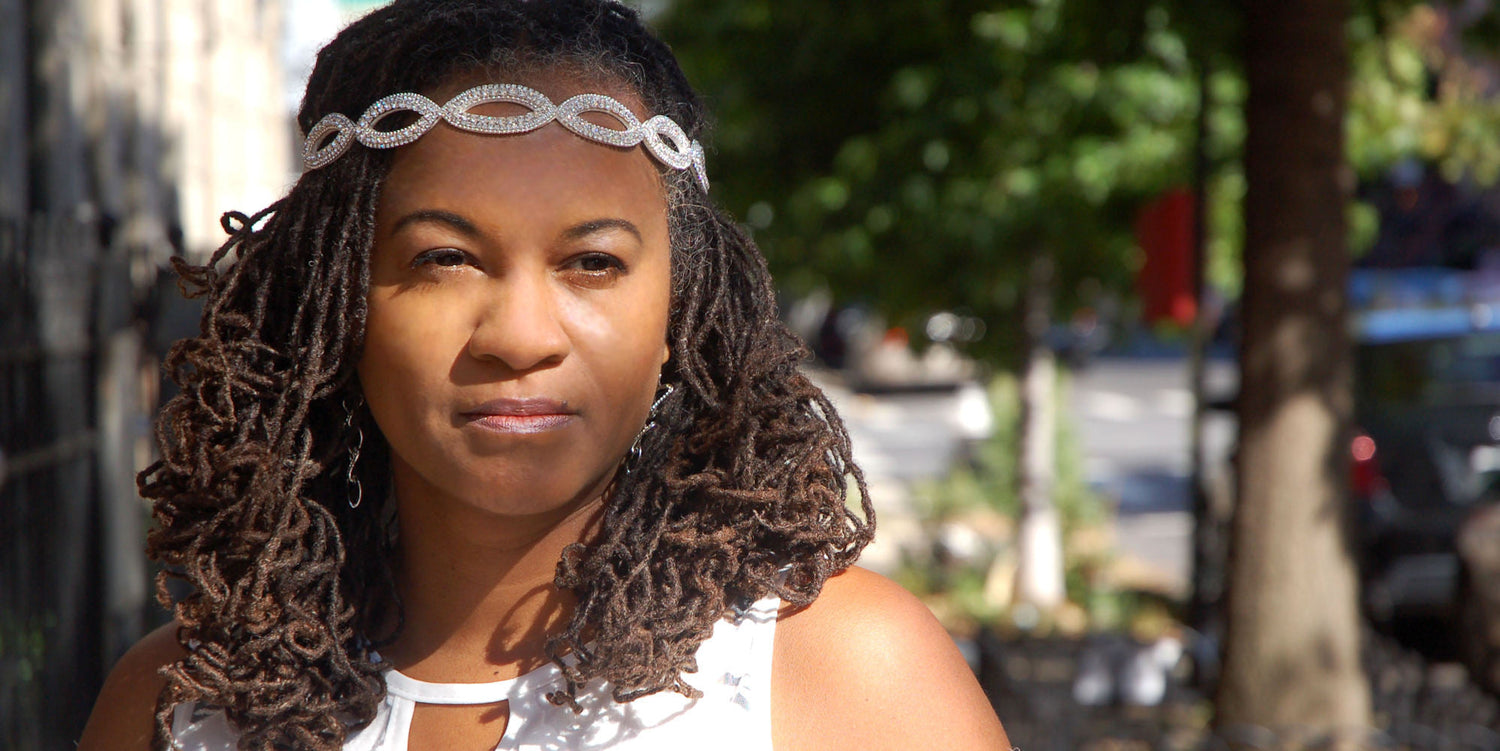 Woman with Sisterlocks wearing a wedding Headband for Locs
