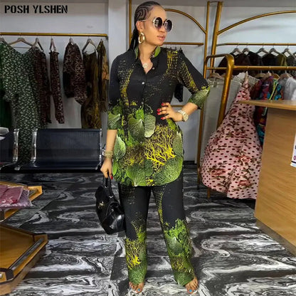 African 2-piece pants set for women featuring a stylish green and black dashiki print. Perfect for casual or special occasions with a chic design.