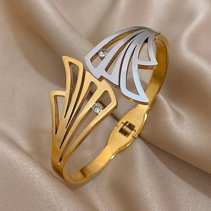 Butterfly Wing Hair Cuff displayed on satin fabric at an angle to show detail