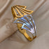 Butterfly Wing Hair Cuff with gold tone geometric wing design and crystal accents
