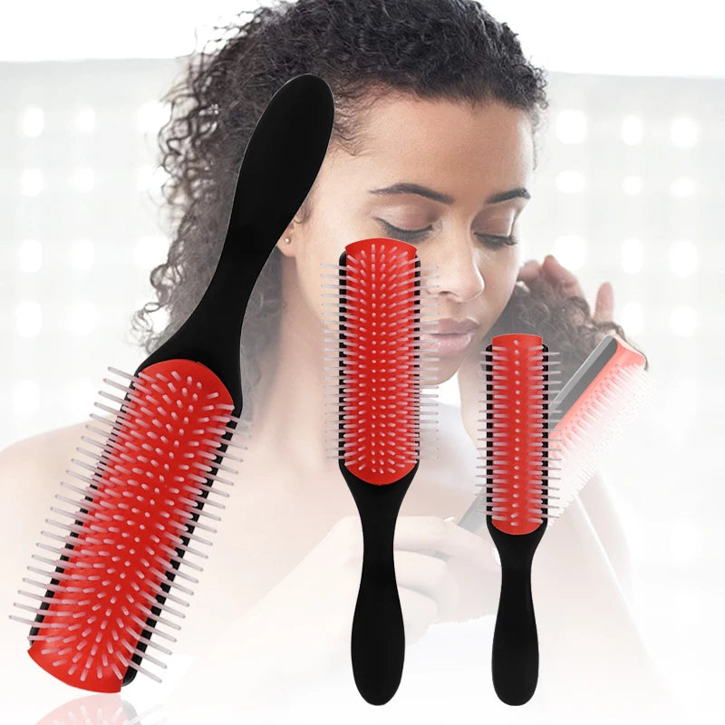woam with curly hair and 3 denman brushes 