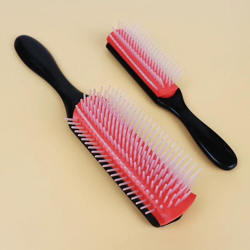 two denman brushes 