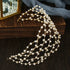 Elegant pearl headband with gold wire detailing, featuring multiple rows of pearls in a netted design. Perfect for bridal or formal occasions.