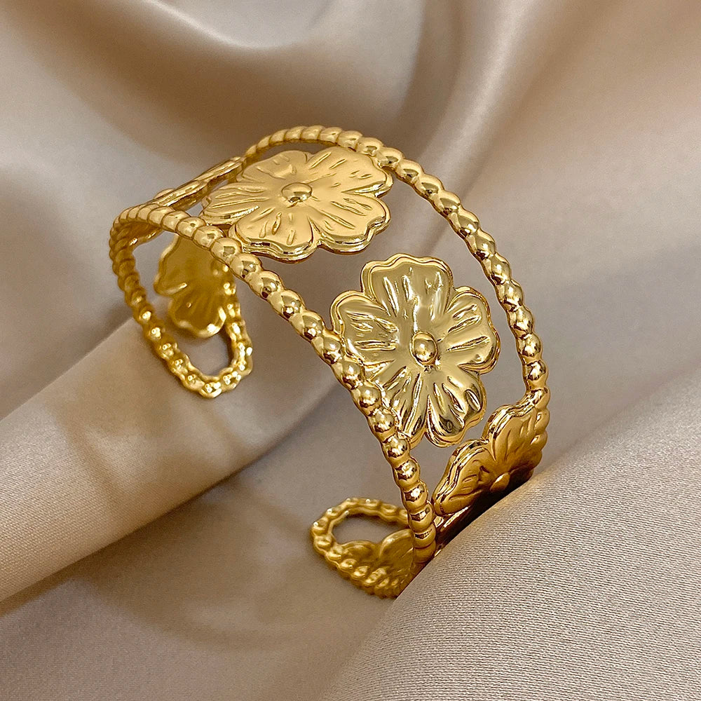 Bold Gold Flower Hair Cuff with open hollow floral design for vintage-inspired looks