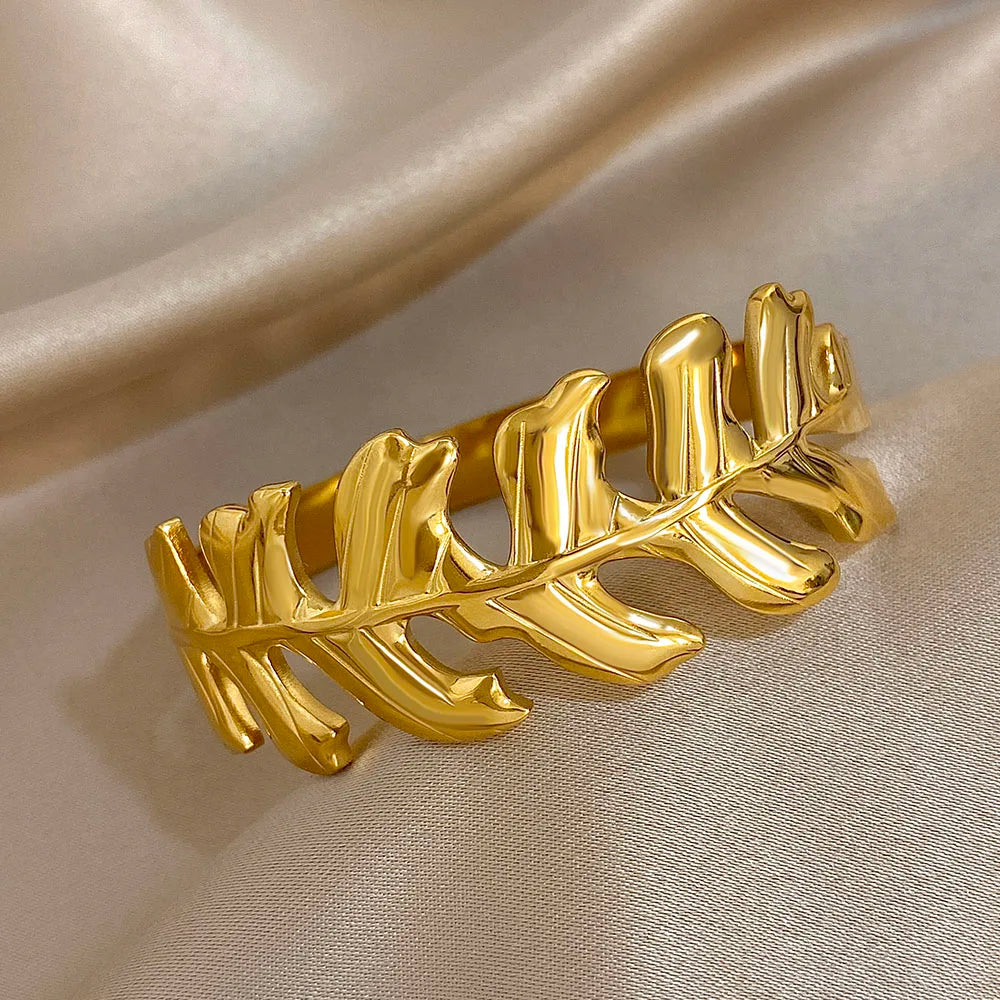 Glossy Gold Leaf Hair Cuff shown from top view with sculpted detailing
