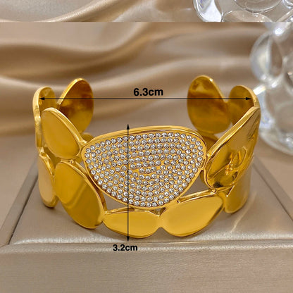 Gold Crystal Geometric Wide Cuff Bracelet  is 3.2 cm long and 6.3 cm wide