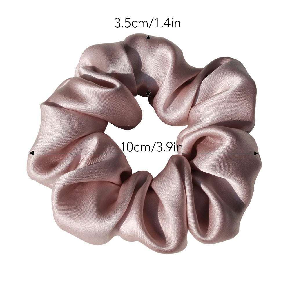 Ivory large mulberry silk scrunchie with a smooth, luxurious finish. Premium silk hair tie designed for frizz-free, damage-free hair styling.